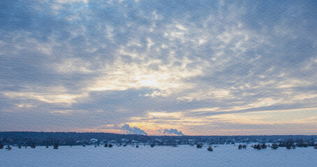 Snowy landscape with a beautiful blue sky and a few clouds