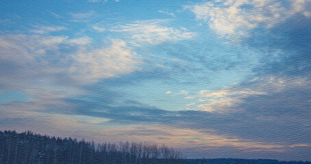Cloudy sky with a blue background