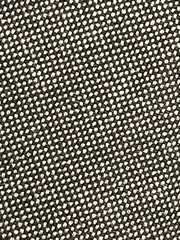 Rough Textured Black and White Woven Chenille Fabric &mdash; Close up of Two-Tone Upholstery Textile