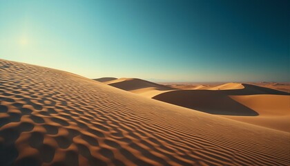 Naklejka premium Endless ochre dunes ripple under a hazy blue sky, shimmering with gold and hinting at hidden paths.