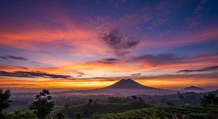 Majestic Mountain Peak at Sunrise with Colorful Sky and Rice Terraces