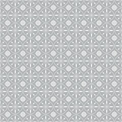 Seamless floral patter design with geometric elements in white color on light grey background