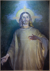 FLORENCE, ITALY - MARCH 20, 2025: The painting of Heat of Jesus in the church Maria Madre della Divina Provvidenza from 20. cent. 
