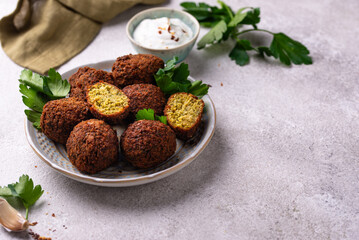 Middle Eastern falafel balls with sauce