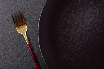Empty plate with fork, cutlery for dinner table