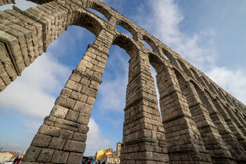 Captivating Segovia Aqueduct Under Cloudy Skies