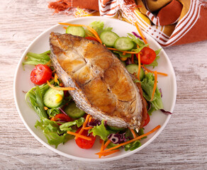 dinner with salad and fish