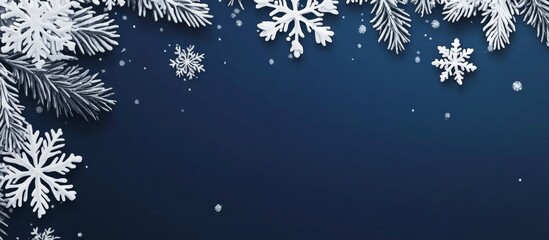 Winter decorative snowflakes and fir branches on dark blue background