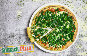 Spinach pizza, top view and copy space.