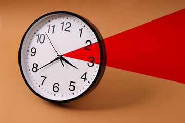 Close-up of a wall clock. The concept of time and work time is valuable for life, Alarm clock...