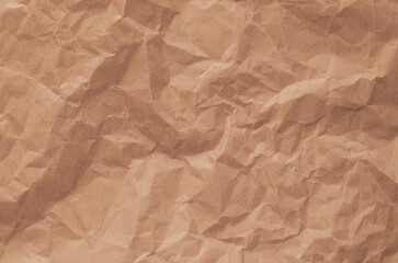 A brown paper with a crumpled texture