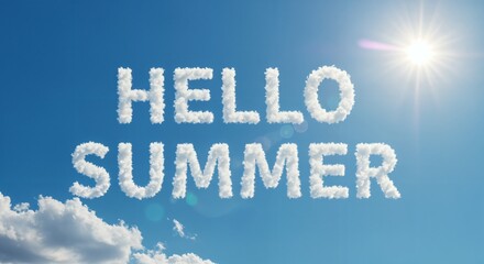 Fototapeta premium HELLO SUMMER text written on sky with fluffy white clouds on a clear and clean light blue sky background
