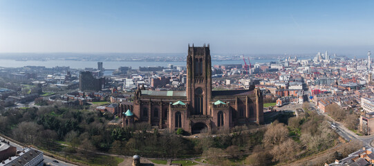 Aerial view of Liverpool featuring the Gothic Revival Liverpool Cathedral, urban streets, green...