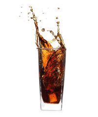 Cola splashing out of glass isolated on white