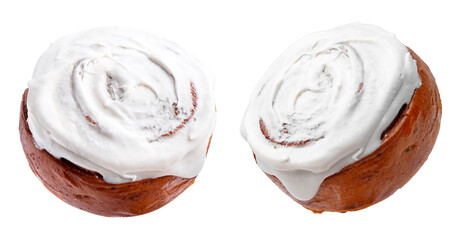 Tasty cinnamon rolls with cream in air on white background