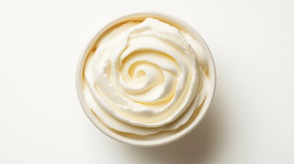 A perfectly formed swirl of fresh Greek yogurt in a bowl, isolated on a white background with a crisp, smooth texture.