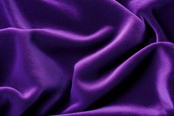 Obraz premium Luxurious purple satin fabric draped elegantly, showcasing rich texture and vibrant color, perfect for design projects