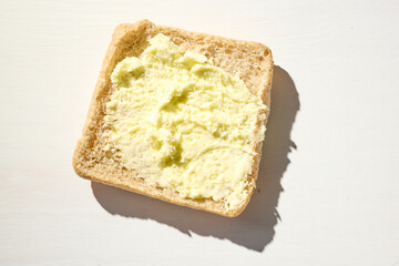 bread slice with whipped butter smear