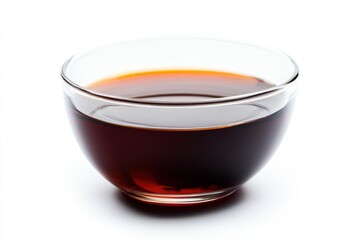 A sweet and sour sauce in a glass bowl, isolated on a white background, with a focus on its vibrant color and smooth texture.