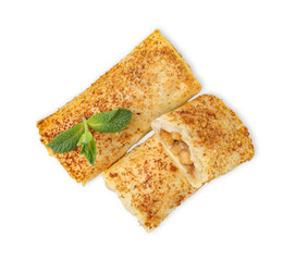 Tasty apple strudels and mint isolated on white, top view