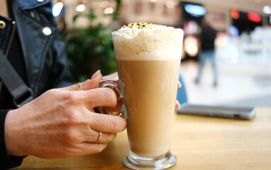 Girl Taking A Glass Of Fresh Aromatic Latte Coffee