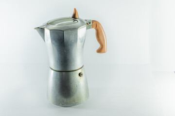 Coffee pot in a white background with space for writing and making designs.