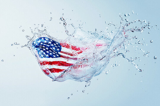 American flag submerged in dynamic water splash