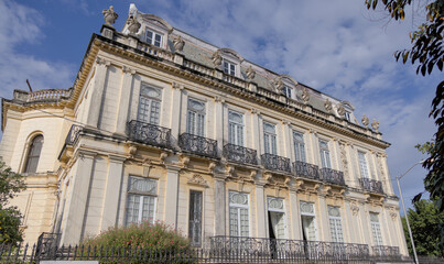 Beautiful colorful yellow opulent luxury mansion building on Paseo de Montenjo in Merida Yucatan Mexico a popular travel tourism destination.