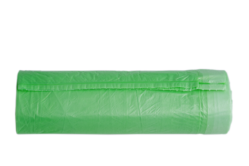 Garbage bags in a roll, green color, isolate.