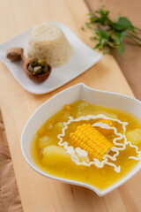 Traditional Colombian Ajiaco Soup with cream