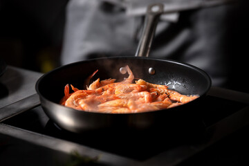 King prawns frying in a hot pan