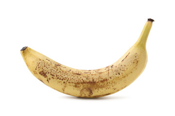 Ripe banana with dark spots isolated on white