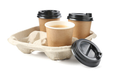 Paper coffee cups in cardboard holder isolated on white