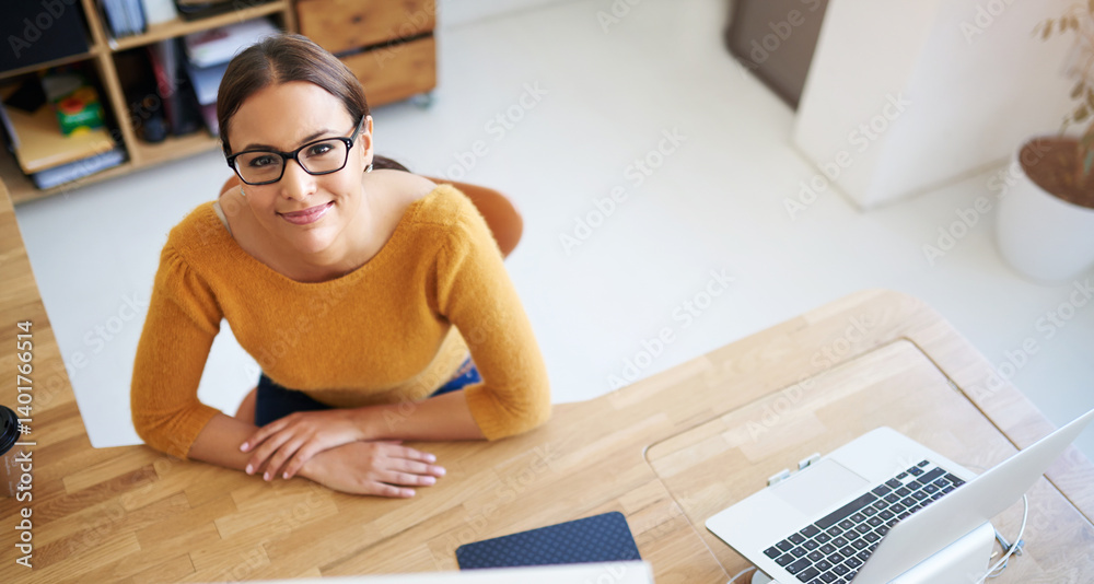 Leinwandbilder Above, desktop and woman in office with project in creative workplace for web developer or coding. Happy, person and development of company website, app or programmer with laptop for productivity
