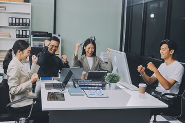 Cheerful meeting room, businesspeople celebrate with handshaking. Successful project was completed before the deadline. Business partnership and collaboration in project management. Habiliment