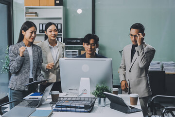 Cheerful meeting room, businesspeople celebrate with handshaking. Successful project was completed before the deadline. Business partnership and collaboration in project management. Habiliment