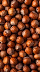 Obraz premium High-Resolution Hazelnut Background Texture, Close-up Pile of Brown Hazelnuts