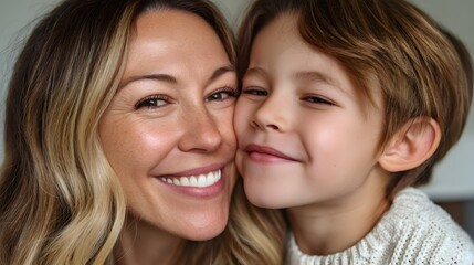 Mother’s Day: A heartwarming close-up captures a mother and child, their faces pressed together in a tender embrace, showcasing a genuine moment of love.