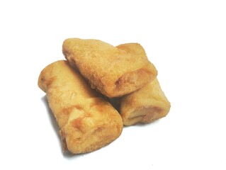 Rissoles , risoles or risol, Indonesian street food. sosis solo,  indonesia traditional snack or appetizer. spring rolls  isolated on a white background. fried spring rolls with green chili. 