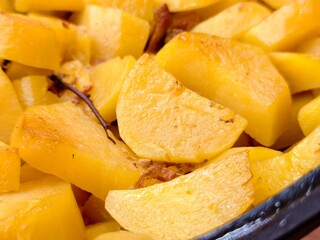 Savory stewed potatoes paired with tender meat create a warm, comforting dish for a cozy gathering at dusk