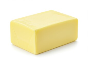 A single block of butter isolated on a white background ready to be used for cooking or baking