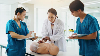 Mannequin, students and cpr training in hospital for medical simulation exam, test or project....
