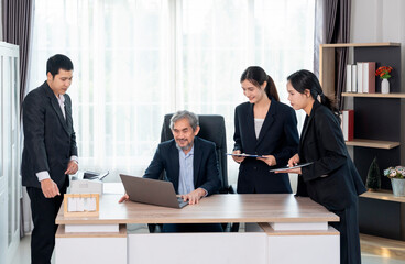 cheerful senior boss during business meeting,employees having conference in boardroom,conversation,consulting,discussing