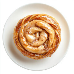 Delicious sweet pancakes and cinnamon rolls on a white plate for breakfast