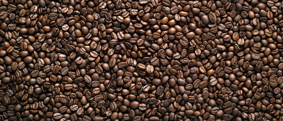 Macro shot of roasted coffee beans, emphasizing their texture.