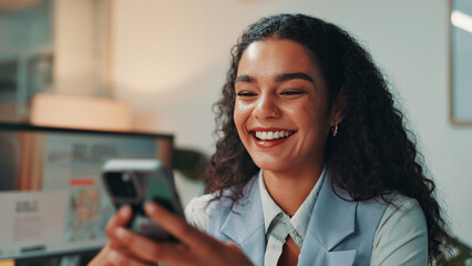 Woman, phone and smile in office for project, message and review for social media proposal. Person,...