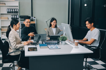 Cheerful meeting room, businesspeople celebrate with handshaking. Successful project was completed before the deadline. Business partnership and collaboration in project management. Habiliment