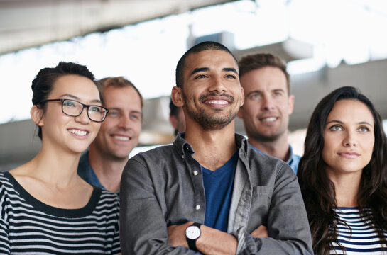 Confidence, creative and group with smile, business and happiness for men, women and collaboration. Advertising agency, designer and employees for project in company, proud and commitment for working