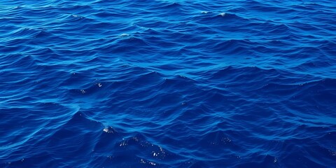 Obraz premium Vast, deep blue ocean surface with subtle waves, scenic, sea