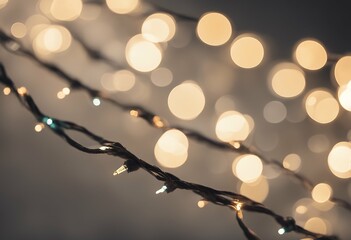 grey background garland over illumination lights bokeh holiday decoration concept christmas sparkle shimmer white luxury defocused beautiful aglow light blurred magical new year gold decorative decor